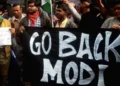 Protest demonstration on Indian Prime Minister's arrival in France; Slogans of Modi is a terrorist raised