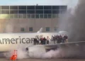 A plane full of passengers caught fire at a US airport, video goes viral